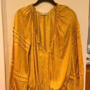 Flowy yellow long sleeve top, is a body suit!